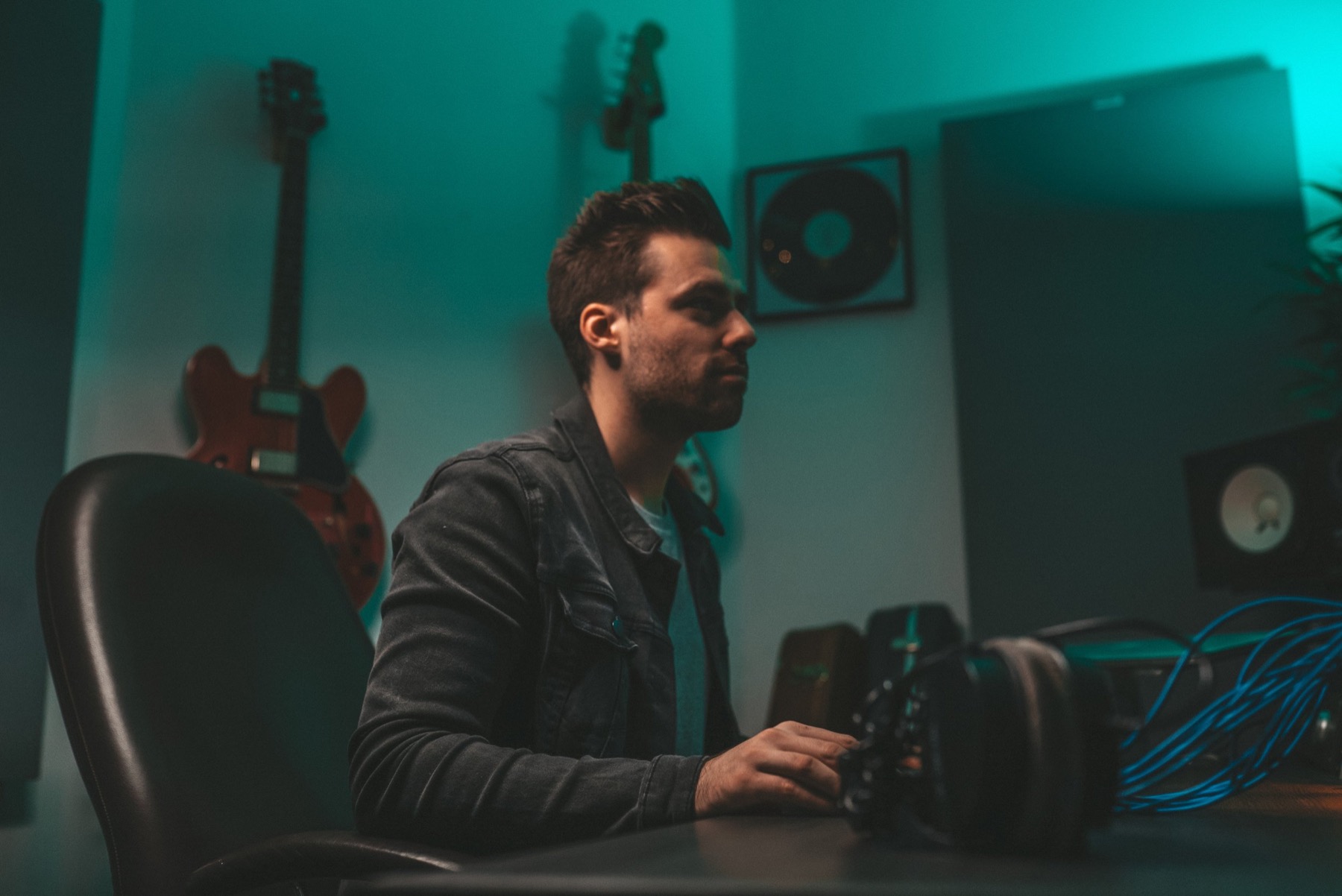 Ed Stokes working at his studio desk